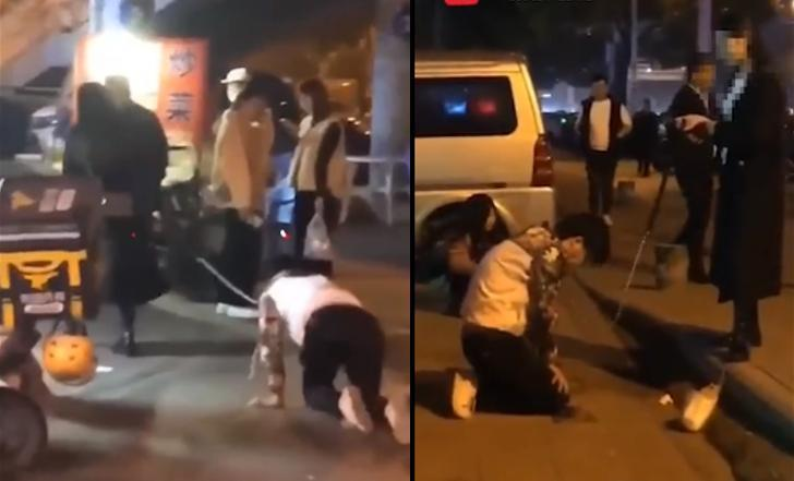 男子脖子拴绳被女子牵着当街爬行，人有尊严，不容践踏，网友：太丢人